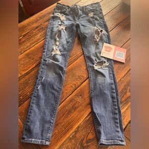 Trendy Distressed Skinny Jeans mid rise “leggings” in Blue size 6